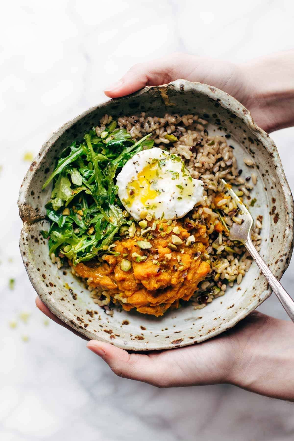 Healing bowl with rice, potatoes, eggs, and greens.