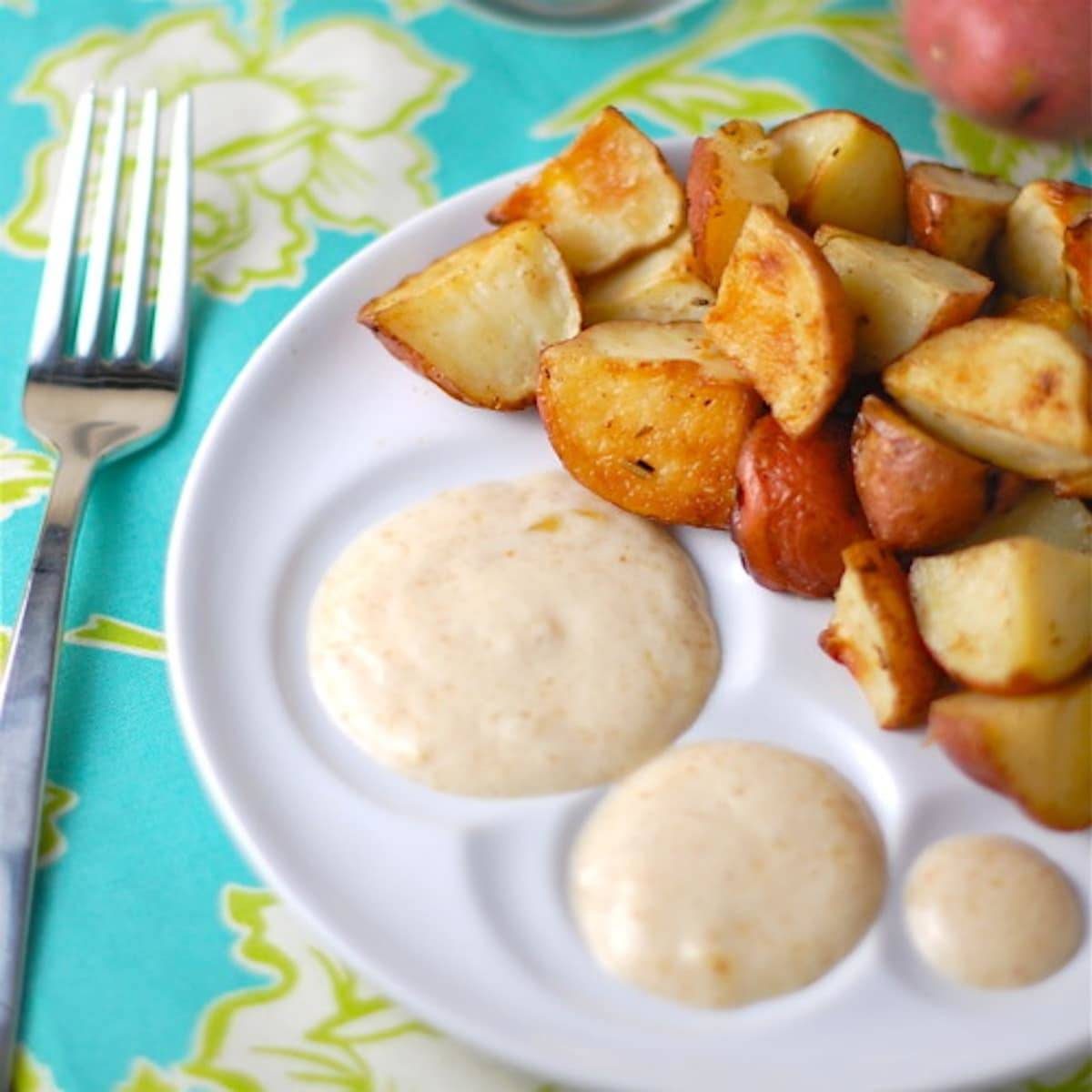 Maple fig sauce with maple syrup and fig preserves and served with simple roasted potatoes.